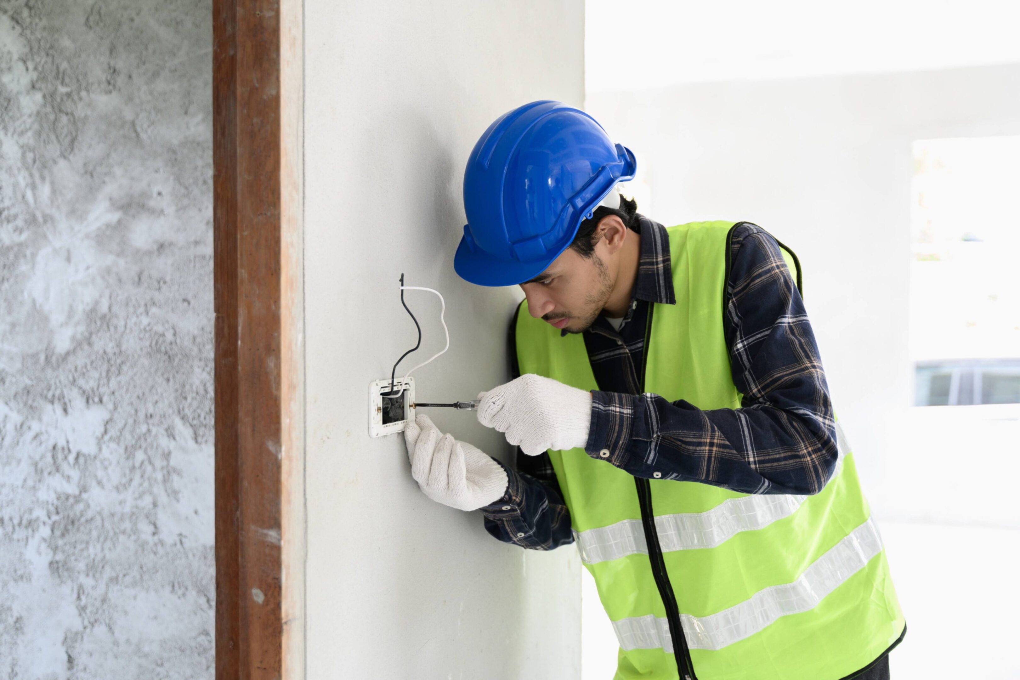 Technician wiring a new socket