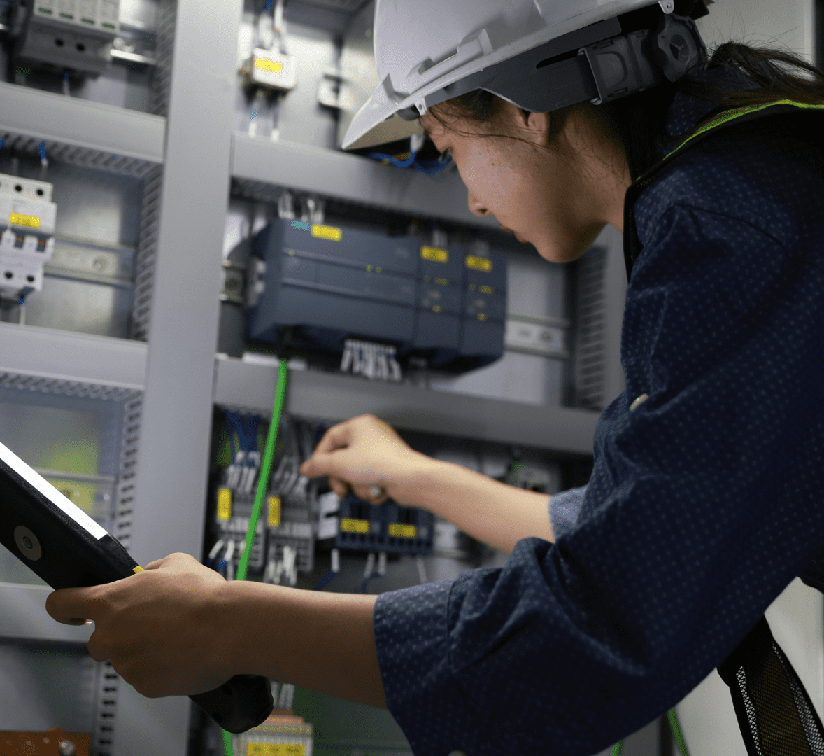 Technician working on circuit board